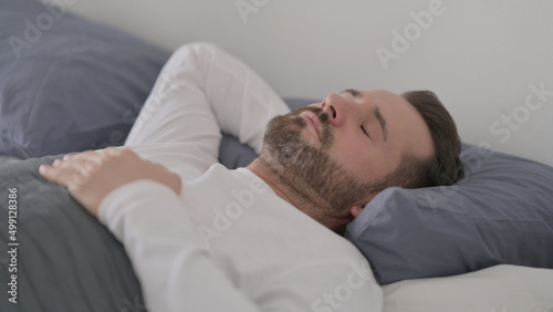 Man Unable to Sleep in Bed