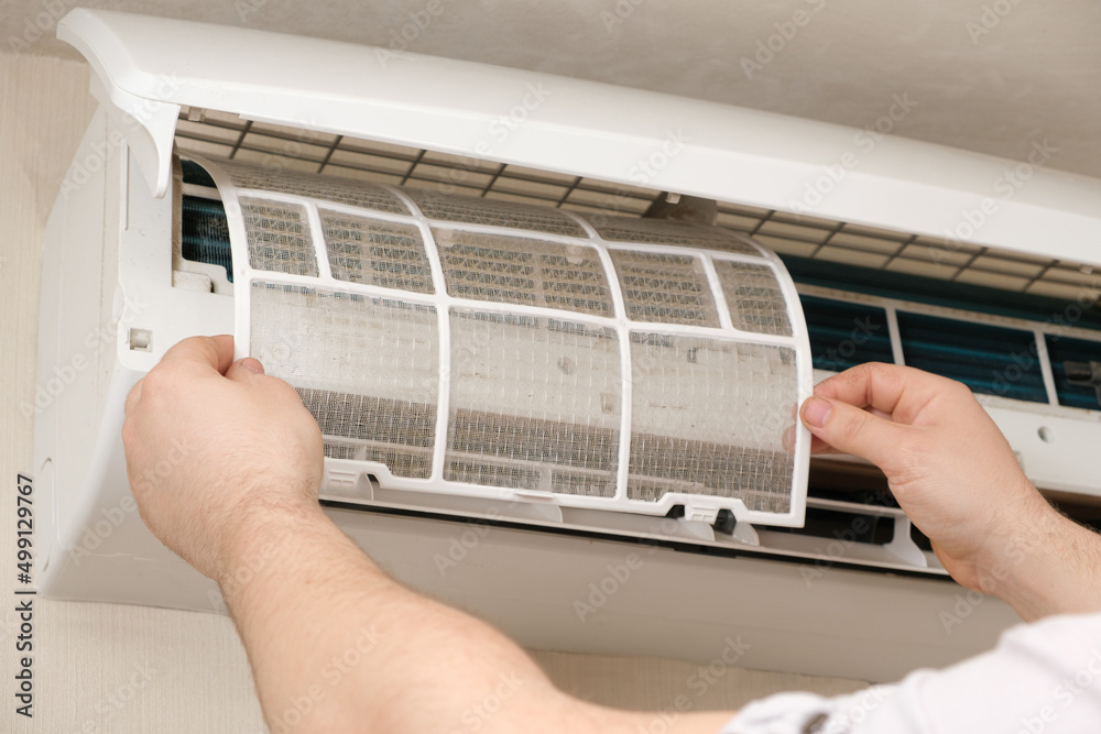 The master installs a clean air conditioner filter after purging