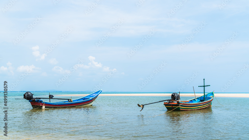 Traditional fishing boats on seaside vacation with blue sky summer season Traditional fishing boats on seaside vacation with blue sky summer season
