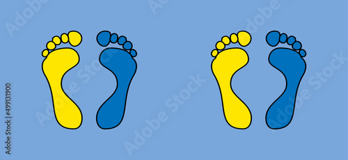 Bare feet silhouette footprints. The color of the Ukrainian flag is blue and yellow. The idea when two people stand side by side.