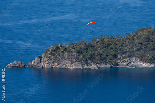 Fototapeta Naklejka Na Ścianę i Meble -  Paragliding in the Oludeniz Beach, Summer Season Fethiye, Mugla Turkey