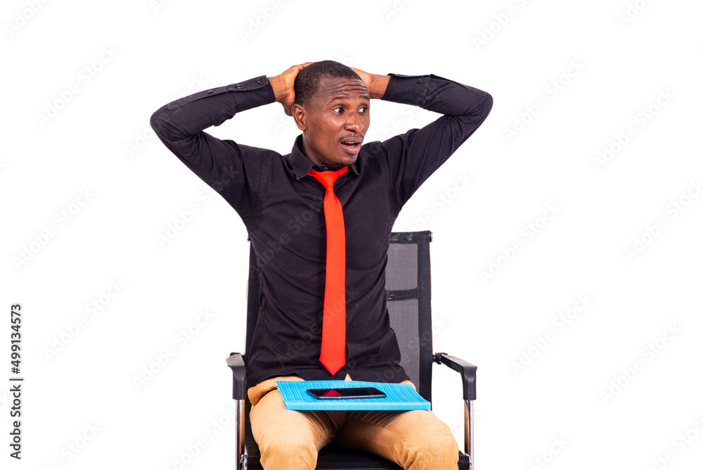 young astonished businessman looking at something sideways. young astonished businessman looking at something sideways.