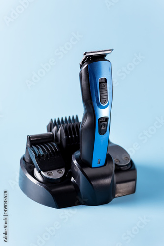 Modern Battery Electric Shaver for Man on Blue Background with Clipping Path