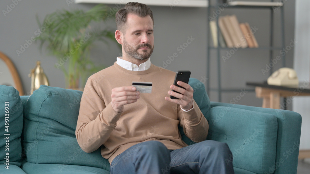 Man making Online Payment on Smartphone Man making Online Payment on Smartphone