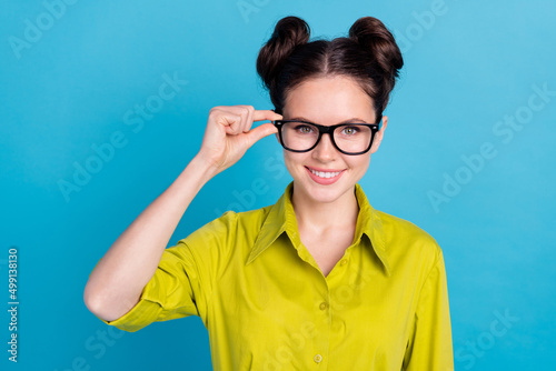 Photo of professional agent ceo lady touching her specs recommend new optics isolated blue color background