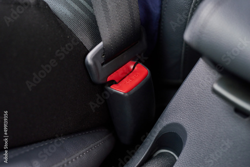 Buckle up. Closeup shot of a seatbelt inside a motor vehicle. photo