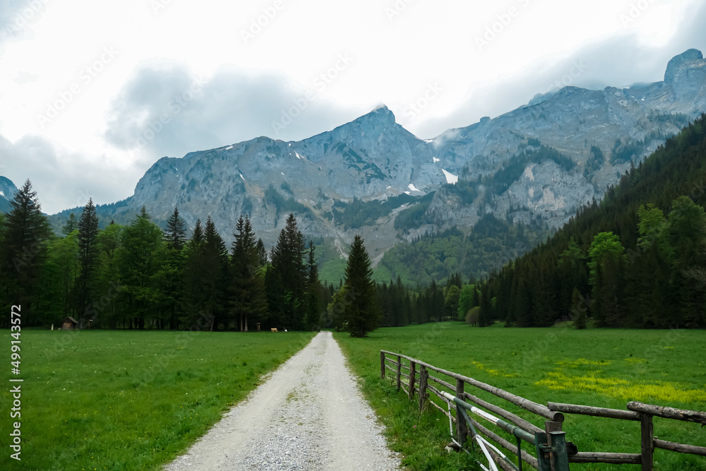 Hiking trail with panoramic view on the mountains of Hochschwab Region in Upper Styria, Austria. Sharp summit of Zinken in the beautiful Alps in Europe. Climbing tourism, wilderness. Concept freedom