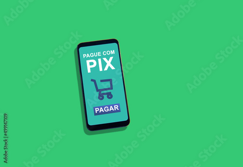 Smartphone screen showing instant payment option via PIX to pay for an online shopping order, with a green background.