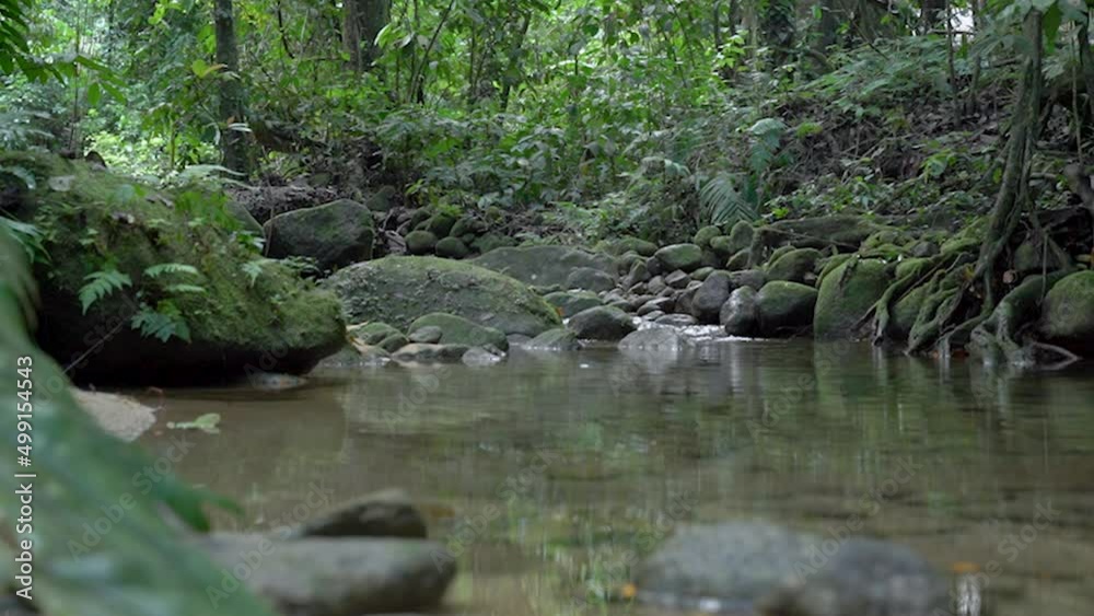 small mountain waterfall that cascades down rocks and rocks with water splashing down tropical nature forest national park thailand small mountain waterfall that cascades down rocks and rocks with water splashing down tropical nature forest national park thailand