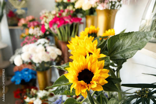 Fototapeta Naklejka Na Ścianę i Meble -  Beautiful different flowers bouquets at street floristic shop