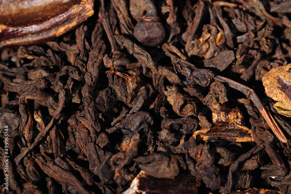 Chocolate black leaf shu pu-erh tea with cocoa beans close-up macro photography Chocolate black leaf shu pu-erh tea with cocoa beans close-up macro photography