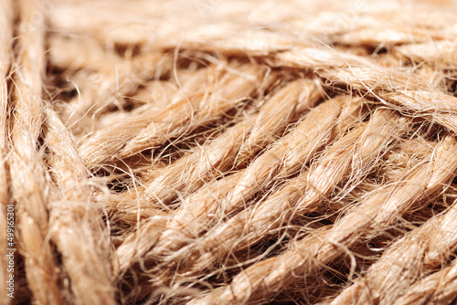 Texture brown skein of jute rope close-up macro photography