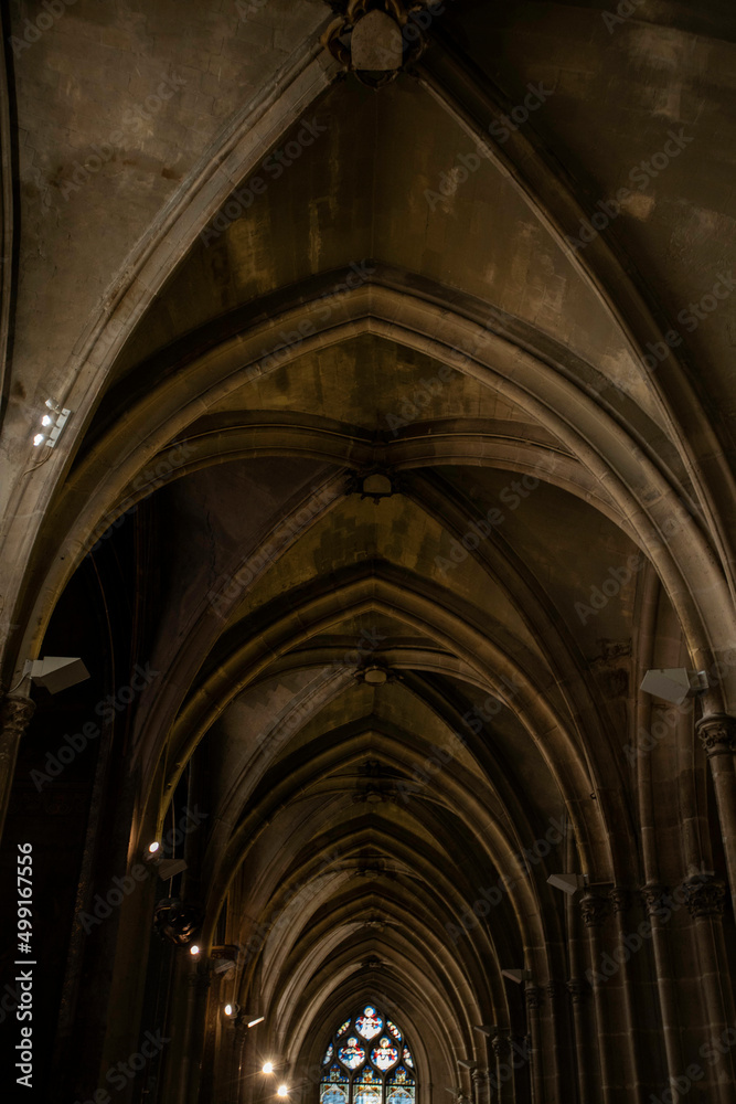 Fototapeta premium Rib Vault ceilings with stained glass windows inside Saint-Severin Church