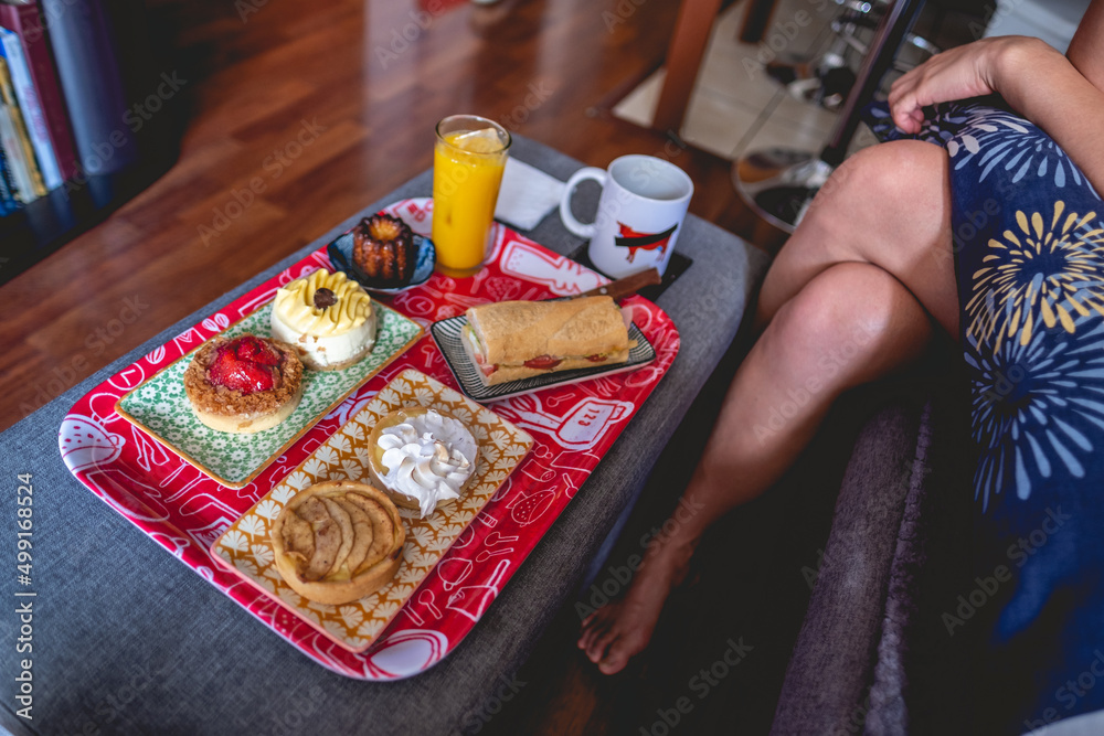 Delicious home breakfast and sexy nude girl (with colorful tray and plates, apple pie, lemon pie, strawberries cake, passion fruit cheese cake, gourmet sandwich, orange juice, coffee and vanilla cake)
