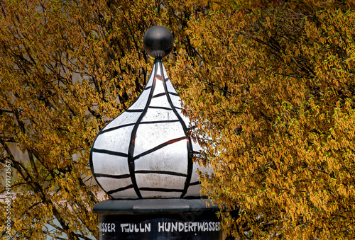 Head of advertising pillar with the name of the former artist Hundertwasser at Tulln, Austria photo