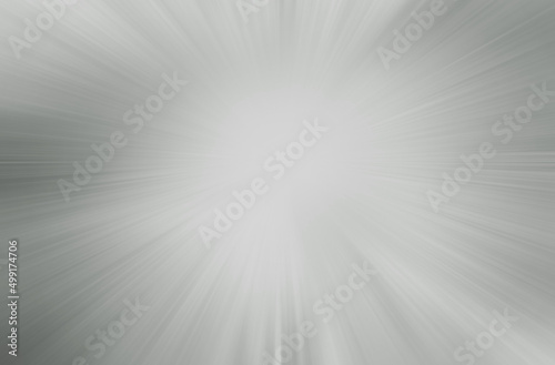 Gray abstract burst rays soft blurred background.