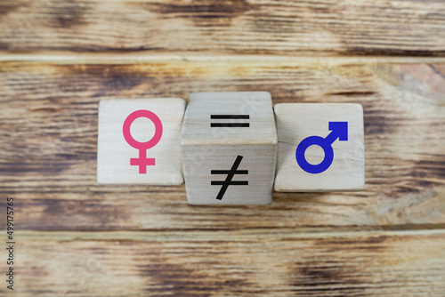 Εκτύπωση καμβά wooden cube with unequal symbol changing to equal sign