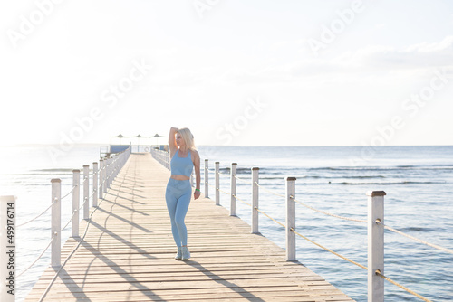woman exercising on pontoon Red Sea