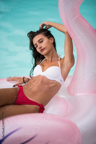 girl in bikini at pool © GianMaria