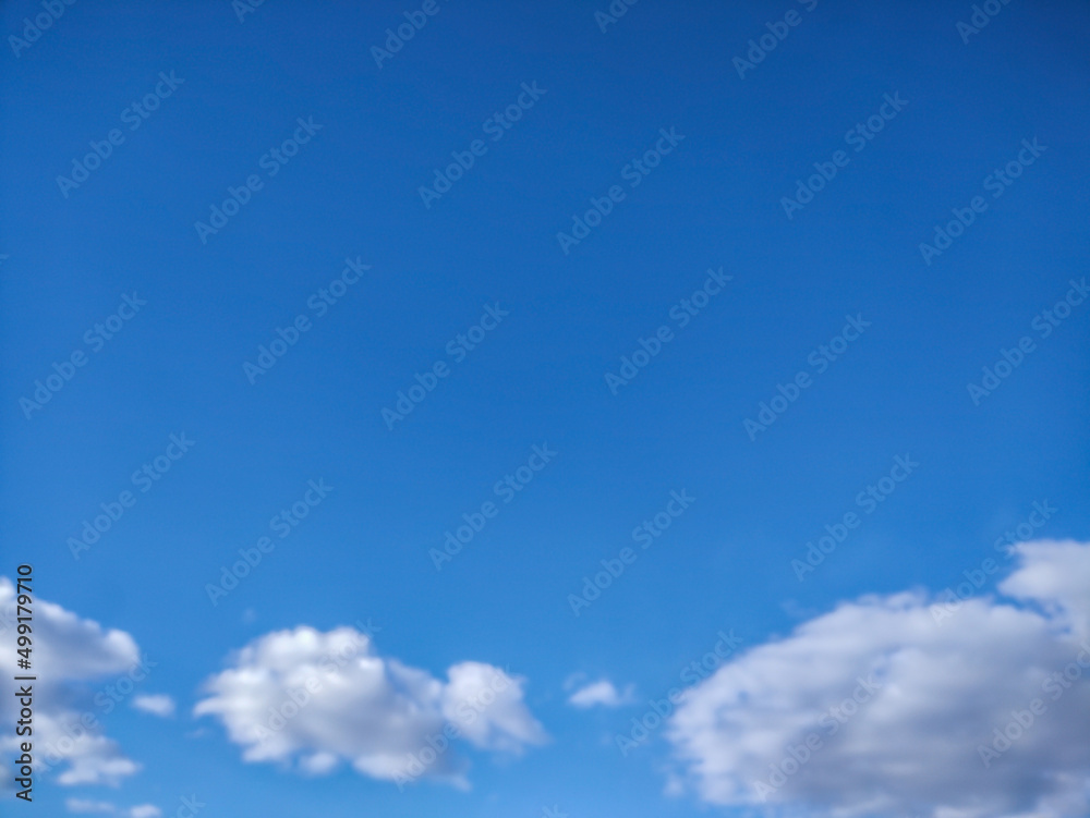 Fluffy cloud texture from a perfect cloudy blue sky Fluffy cloud texture from a perfect cloudy blue sky