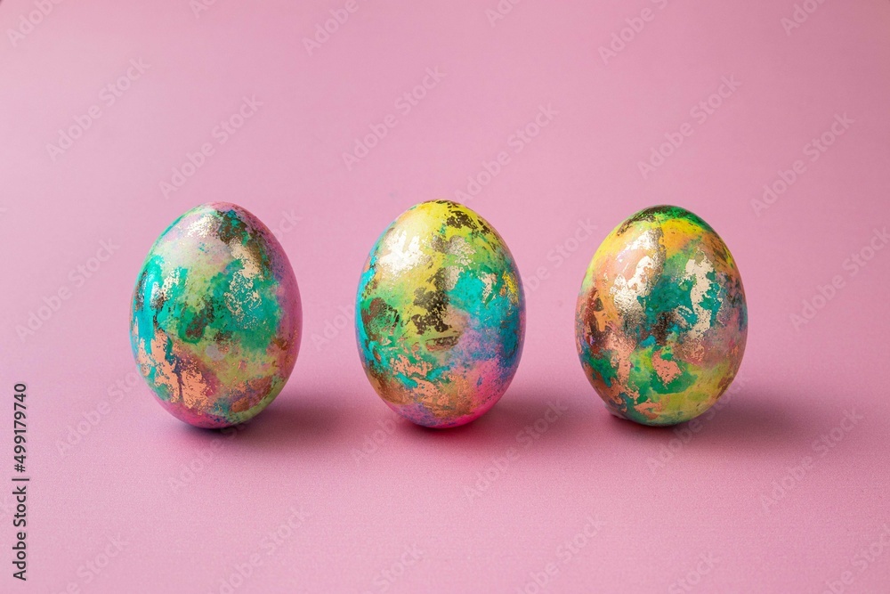 Easter colorful eggs on pink background. Easter card. Copy space for text. Selective focus. Easter colorful eggs on pink background. Easter card. Copy space for text. Selective focus.