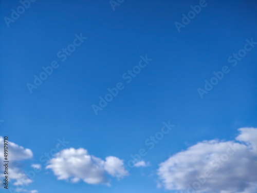 Fluffy cloud texture from a perfect cloudy blue sky