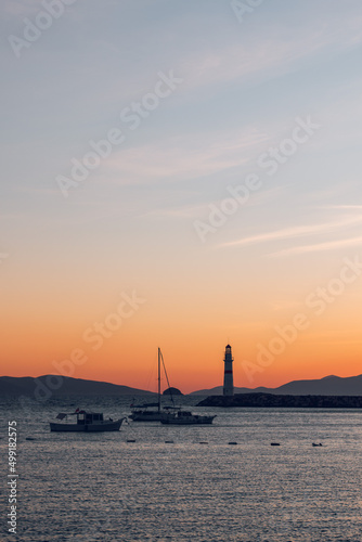 Turgutreis lighthouse at sunset in bodrum Turkey © Т Т