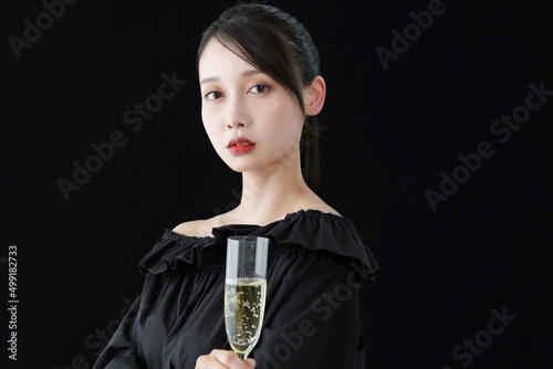 Young woman with champagne glass