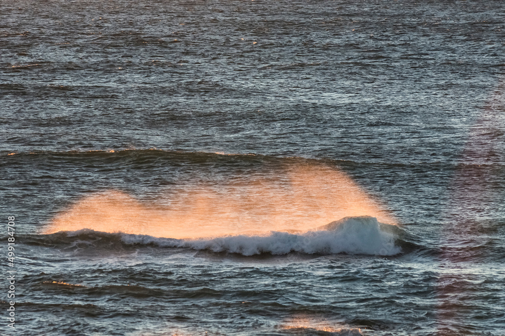 Obraz premium Waves with strong wind after a storm, Patagonia, Argentina.