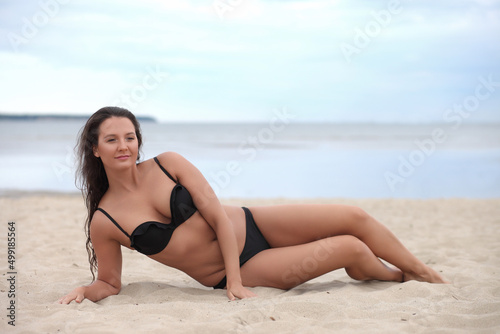 Beautiful woman in bikini on the beach