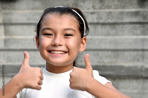 A Smiling Proud Asian Child