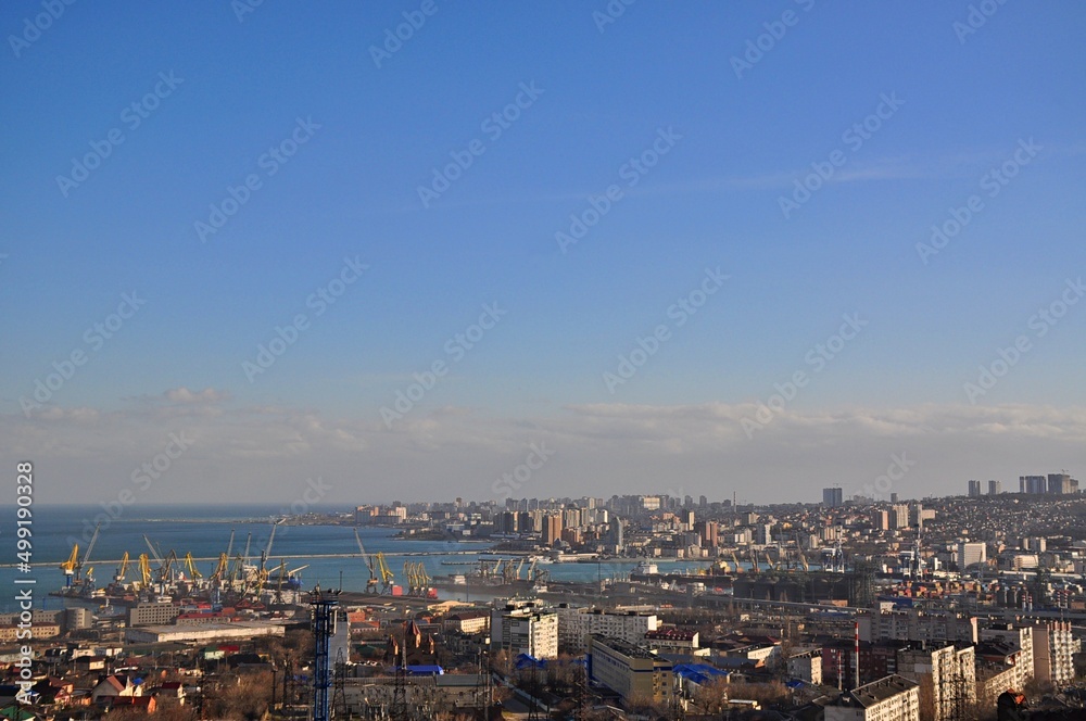 View of the city from the height of the mountains. Novorossiysk. Russia. Krasnodar Territory. The largest port in Russia, including passenger, cargo ports and an oil harbor. Important transport hub.