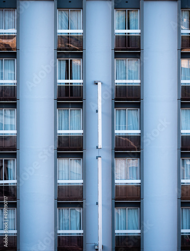 Generic facade of an apartment building with many windows © Taljat