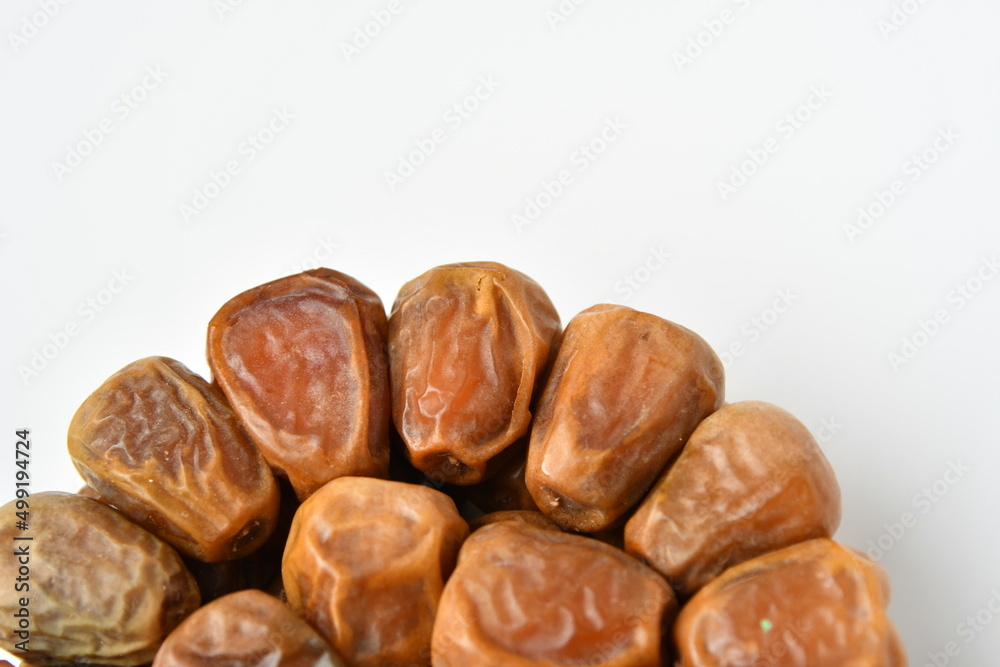 Arabic dates, sugary dates on the white
Arabic dates, sugary dates on the white