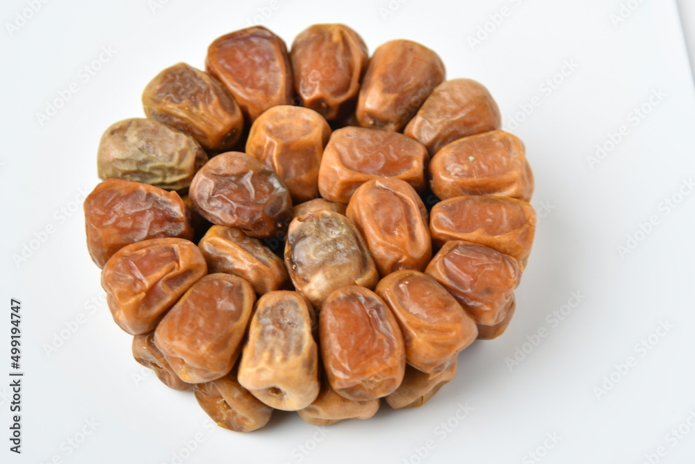 Arabic dates, sugary dates on the white
Arabic dates, sugary dates on the white