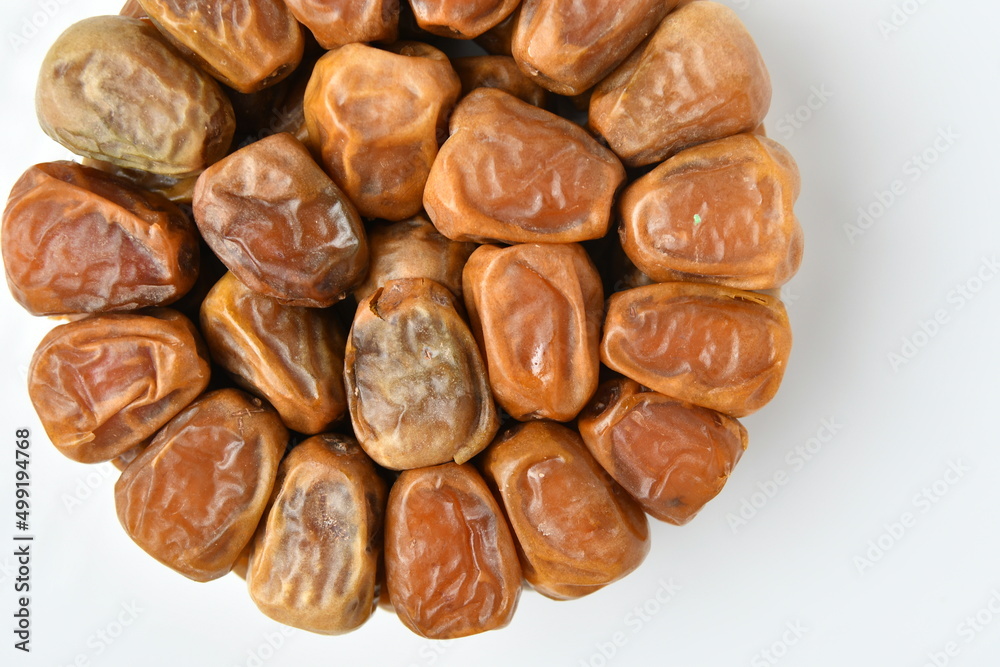 Arabic dates, sugary dates on the white
Arabic dates, sugary dates on the white