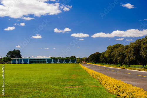 palácio da alvorada, residência oficial do presidente do brasil, com pista de acesso e arborização photo