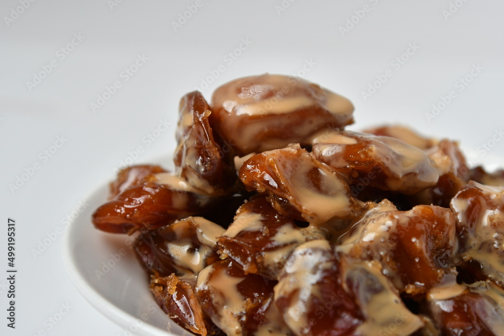 Fresh Arabian dates (Khalas dates ) isolated on white background Fresh Arabian dates (Khalas dates ) isolated on white background