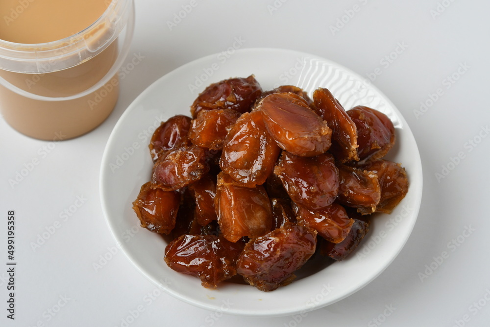 Fresh Arabian dates (Khalas dates ) isolated on white background Fresh Arabian dates (Khalas dates ) isolated on white background