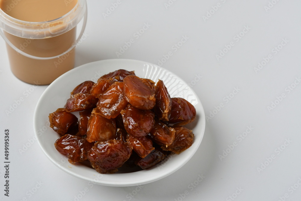 Fresh Arabian dates (Khalas dates ) isolated on white background Fresh Arabian dates (Khalas dates ) isolated on white background