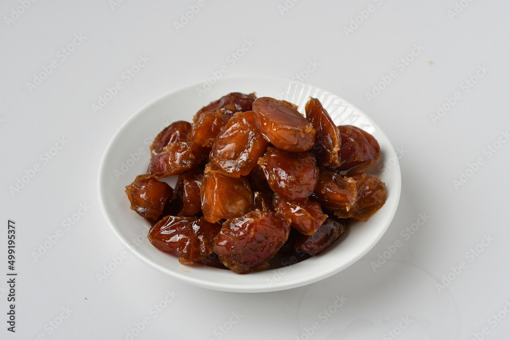 Fresh Arabian dates (Khalas dates ) isolated on white background Fresh Arabian dates (Khalas dates ) isolated on white background