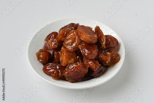 Fresh Arabian dates (Khalas dates ) isolated on white background