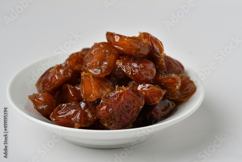 Fresh Arabian dates (Khalas dates ) isolated on white background