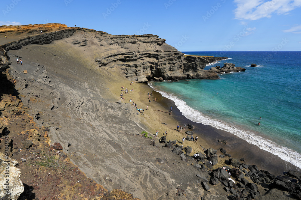 Layers of olivine crystals on the landslide above Papakolea Beach aka Green Sand Beach near South Point on Big Island, Hawaii, United states
