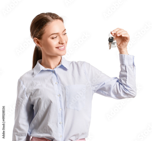 Real estate agent holding k...