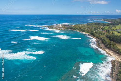 Aerial view of multiple bays on a clear sunny day the Northshore of Oahu near Turtle Bay in Hawaii. 