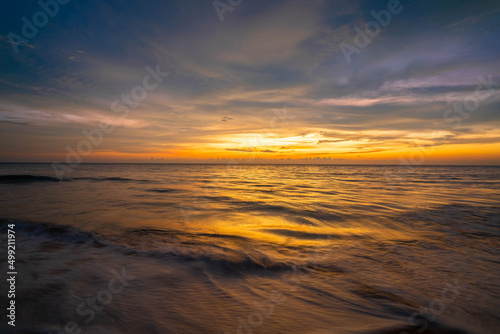 beautiful sunset and orange sky by the sea © Sunanta