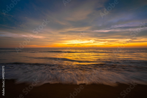 beautiful sunset and orange sky by the sea © Sunanta