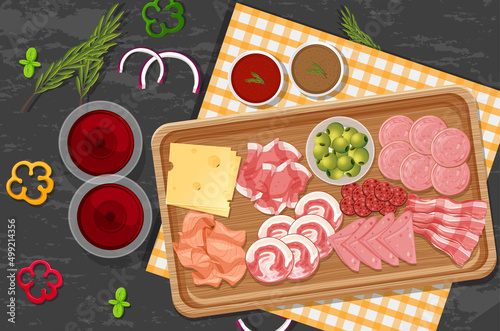 Top view of lunch meat on a wooden tray