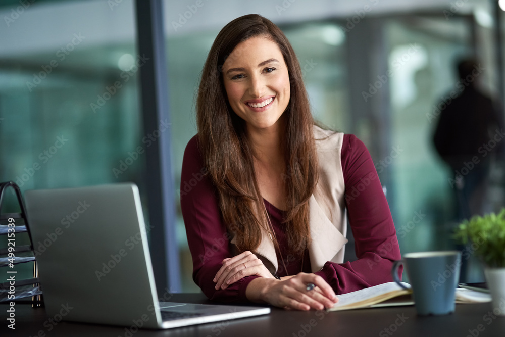 Awareness is the first step.... Shot of a businesswoman sitting at her desk with her laptop. Awareness is the first step.... Shot of a businesswoman sitting at her desk with her laptop.